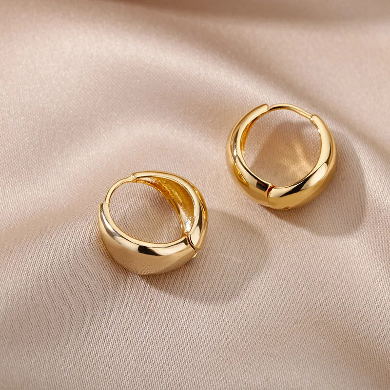 Chunky Oval Gold Huggie Earrings – Smooth Drop Hoops